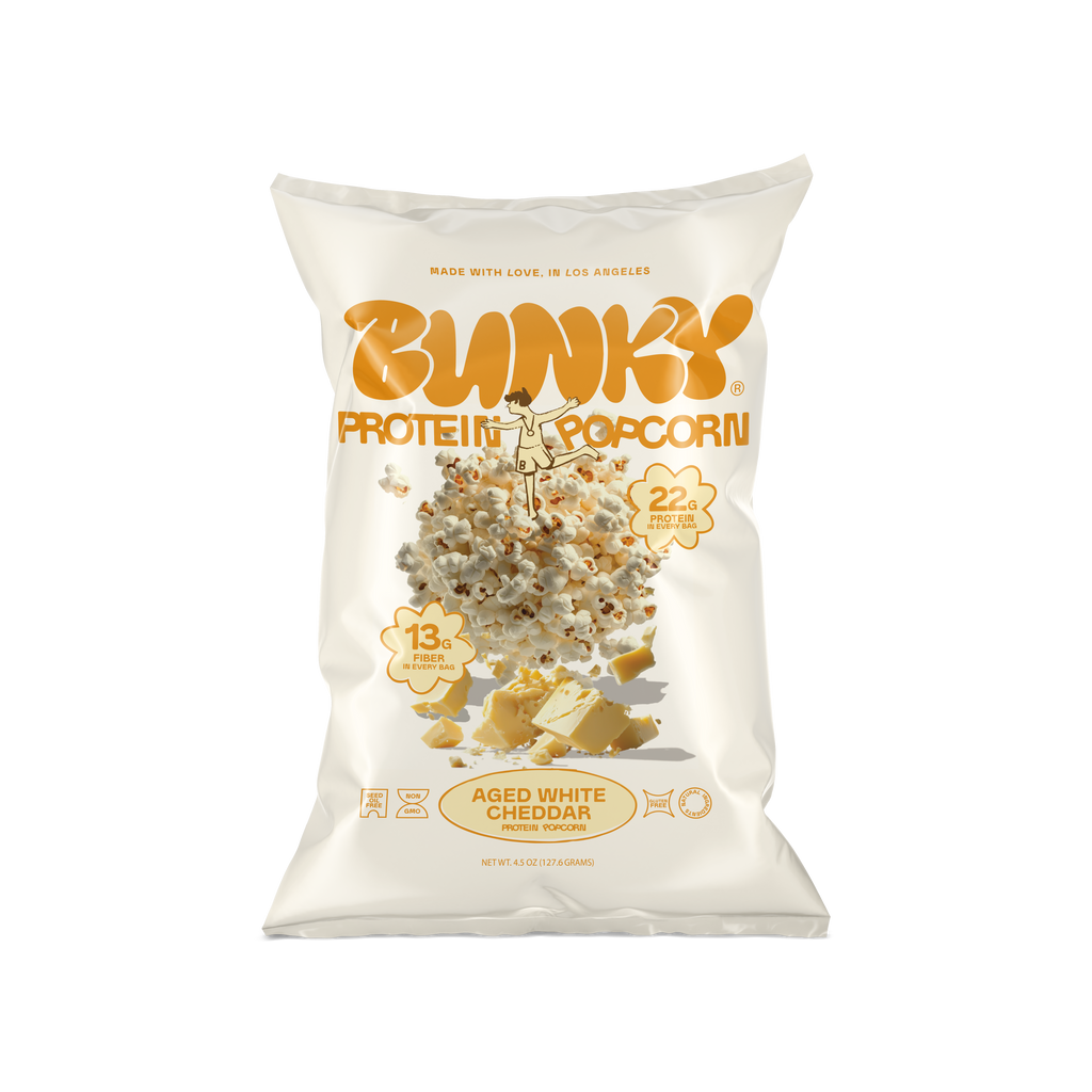 BUNKY Aged White Cheddar protein popcorn bag, up to 22g protein, zero seed oils
