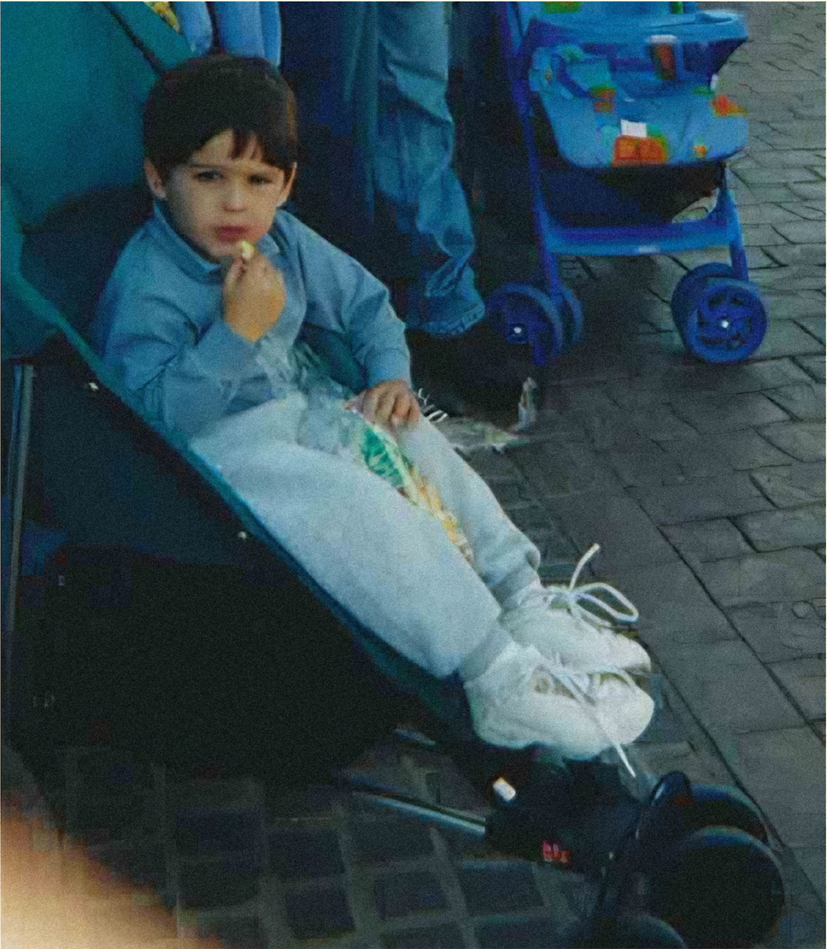 Young Davis Freeman, founder of BUNKY, eating popcorn